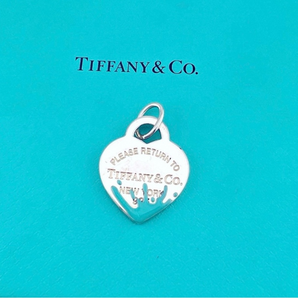 Tiffany & Co. Brand New, Authentic blue splash heart charm “Return to Tiffany”.